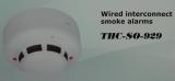 Wired interconnect smoke alarms